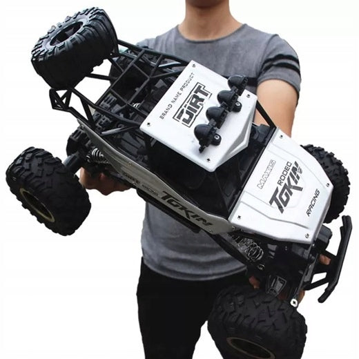 Nuotoliniu būdu valdomas visureigis „Monster“ 4x4 su LED, metalinis, 1:12